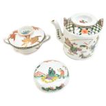 Three pieces of Chinese porcelain comprising a Famille Verte teapot and cover painted with boys at