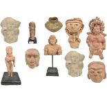 A group of busts and fragmentary figures including three South American civilisations examples,