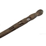 An early 20th century African tribal Betel nut carrier, length 113cm.