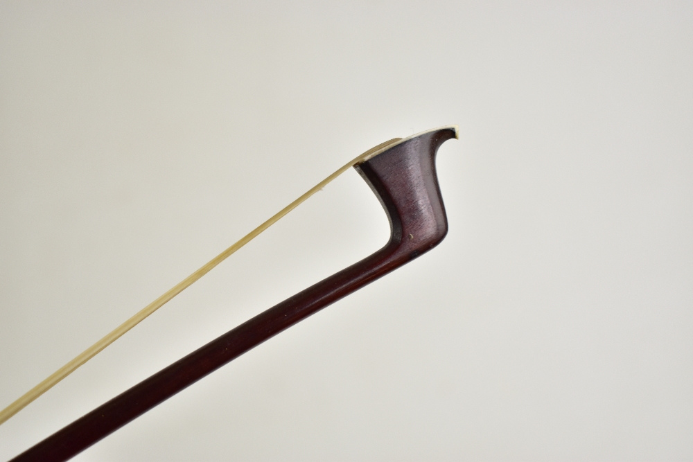 A silver mounted violin bow stamped 'Chanot', overall length 74.3cm. Additional InformationGeneral - Image 7 of 16