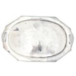 An early 20th century Japanese silver twin handled octagonal tray, the central section with hammered