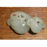 A Chinese pale jade carving of lingzhi sprigs and leaves, unmarked, length 6cm.Additional