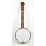 GEORGE FORMBY; a banjo, incised signature to head, length 56cm, lacking case.Additional