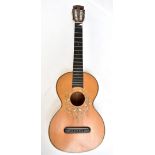 An early 20th century six string acoustic guitar with inlaid, painted and mother of pearl decoration