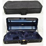 A double violin/viola case by Oliver Bergner.