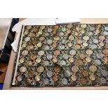 A selection of Japanese fabric including a large roll with gilded decoration depicting floral