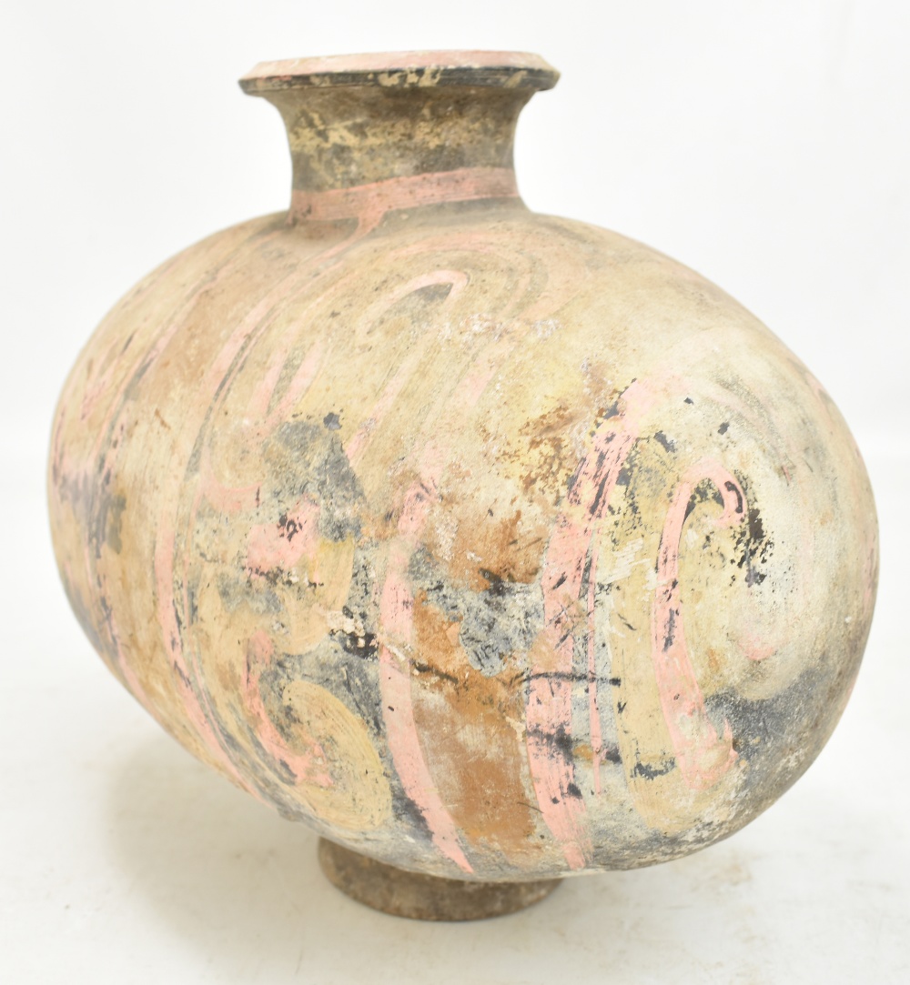 A Chinese Han dynasty earthenware cocoon vase with simple painted stylised detail on circular - Image 6 of 10