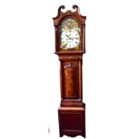 An early to mid-19th century mahogany longcase clock with repainted arched dial inscribed 'JAS.