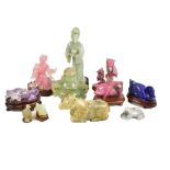 Eleven Chinese hardstone and glass figures and animals including rhodonite models of a pig and owls,