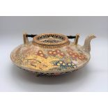 A Japanese Meiji period Imperial Palette Satsuma squat teapot painted with floral sprays and
