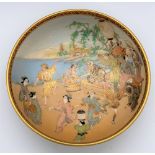 KUSHIDA SHOZAN; a fine Japanese Meiji period Satsuma chawan internally decorated with revellers at a