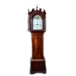 An early 19th century mahogany and inlaid longcase cclock with repainted arch dial set with