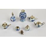 A 19th century Chinese miniature porcelain toy/doll's tea set, jug and two vases, floral painted