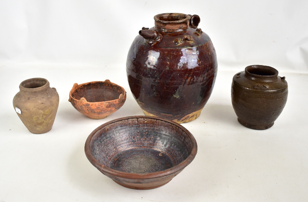 A Chinese bowl, circa 200 BC, with painted interior decoration and four moulded rim mounts, diameter