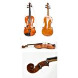 A full size German violin, Stradivarius copy with two-piece back, length 35.8cm and typical label,