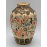 A Japanese Meiji period Satsuma ovoid vase decorated with children amongst floral sprays, with