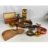 A group of African and Eastern tribal items including South African coloured beads, woven bangles,