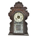 ANSONIA CLOCK COMPANY OF NEW YORK USA; a late 19th century American gingerbread clock, the case with