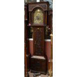 A 19th century oak cased eight day longcase clock, the brass dial set with Arabic and Roman numerals