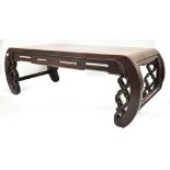 A Chinese rosewood coffee table of rectangular form with shaped curved legs, length 97cm.