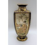 A Japanese Meiji period Satsuma vase of square baluster form with four panels decorated with
