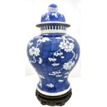 A late 19th/early 20th century Chinese porcelain blue and white temple jar and cover, decorated with