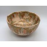 A good Japanese Meiji period Satsuma bowl, the central reserve painted with figures in a procession,