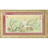 A 19th century Chinese watercolour on silk depicting a cockatoo amongst blossoming branches, with