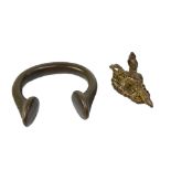 An 18th century bronze henna seal and West African trade ring (2).