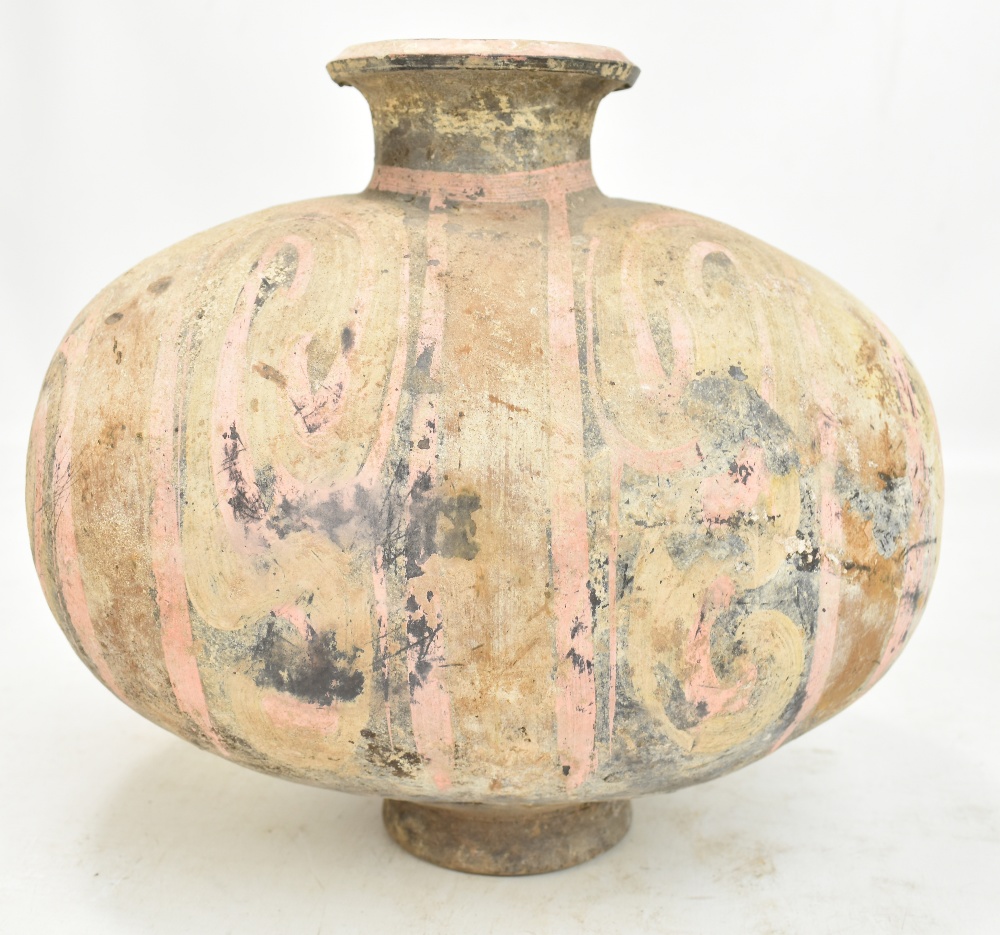 A Chinese Han dynasty earthenware cocoon vase with simple painted stylised detail on circular - Image 5 of 10