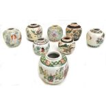 Eight 20th century Chinese enamel decorated ginger jars, the majority with figural scenes, one