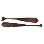 A matched pair of late 19th century South Sea Island paddles, probably Solomon Islands each with