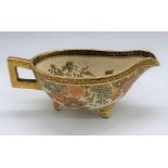 A good Japanese Meiji period Satsuma sauce boat internally decorated with children playing and