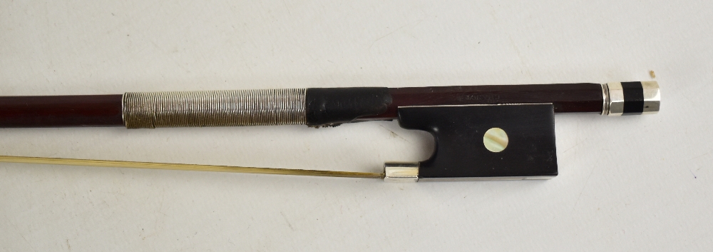 A silver mounted violin bow stamped 'Chanot', overall length 74.3cm. Additional InformationGeneral - Image 2 of 16