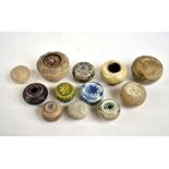 A group of circa 14th-15th century Sawankhalok (Thailand) circular boxes and vessels, some with
