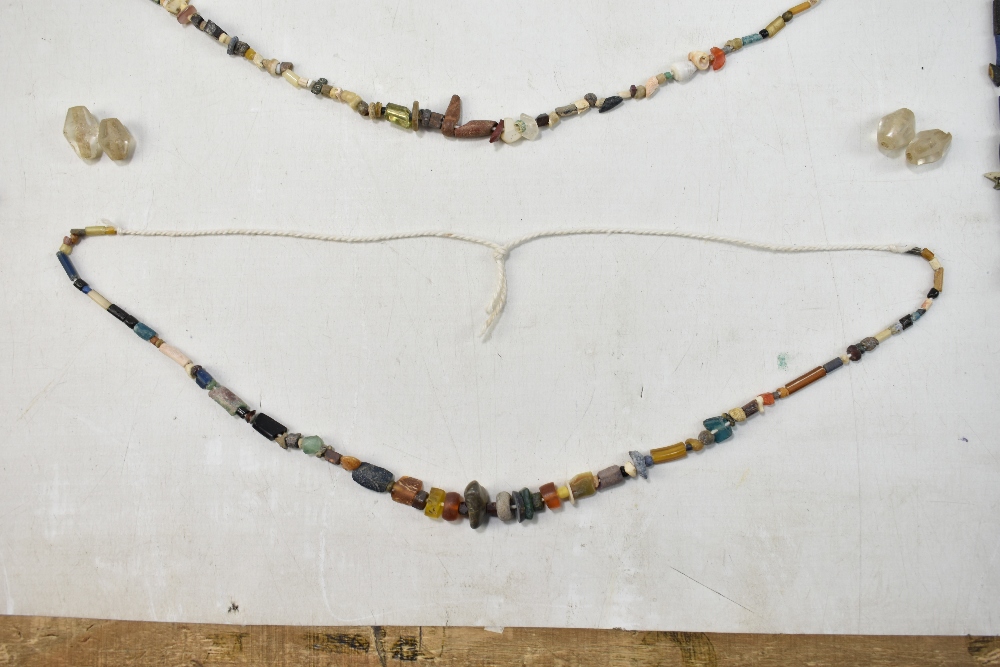 A small group of ancient jewellery including Egyptian faience turquoise glazed beads, Javan orange - Image 9 of 18