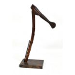 An African axe on stand, height 40cm.