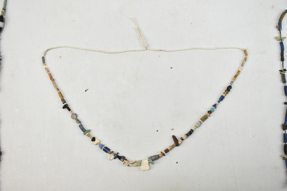 A small group of ancient jewellery including Egyptian faience turquoise glazed beads, Javan orange - Image 12 of 18