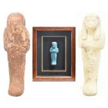 A turquoise glazed Egyptian Ushabti, length 10cm, framed and glazed, and two further stone