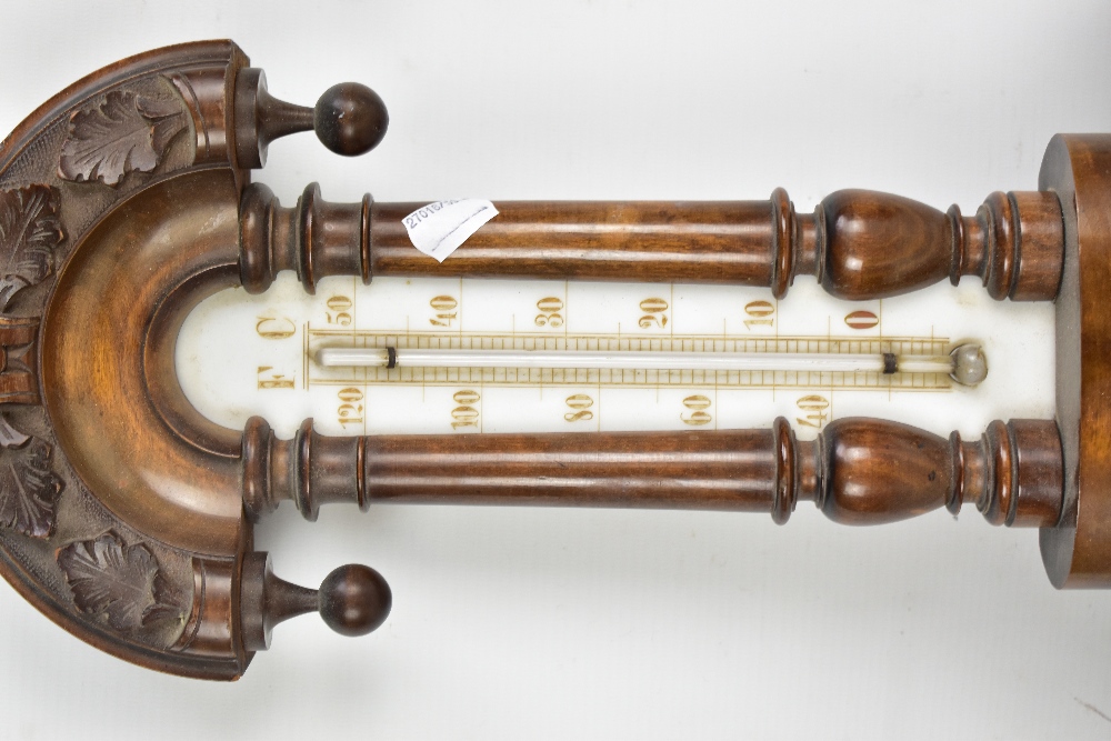 A circa 1900 carved walnut and beech wheel barometer with relief carved detail and upper - Image 2 of 5