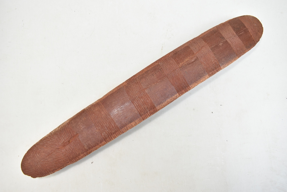 A mid-20th century Northern Australian parrying shield with bands of simple carved decoration, - Image 3 of 11
