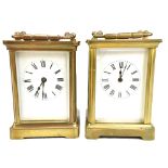 Two early 20th century brass cased carriage clocks, the circular enamel dials set with Roman