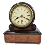 JOHNSON OF LONDON; a 19th century burr walnut veneered and ebonised drum mantel clock, the