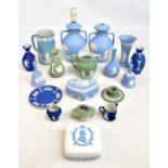 A quantity of assorted Wedgwood including a pair of twin handled lamp bases, candlestick, etc.
