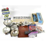 A collection of automobilia including six headlamps (two af), spanners and various tools and