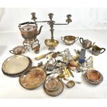 A mixed group of electroplated items including a kettle on stand, triple sconce candelabrum, two