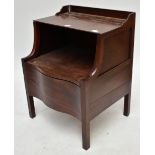 A George III mahogany step commode of serpentine outline.