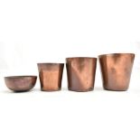 Three tapered conical copper measures, the largest approx 6 x 6cm, and a small bowl (4).Additional