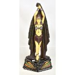 VERONESE; an Art Deco style resin figurine modelled in the form of a dancing figure with out swept