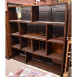 A contemporary oak effect twin sectioned bookcase/display unit, height 210cm, length 221cm, depth